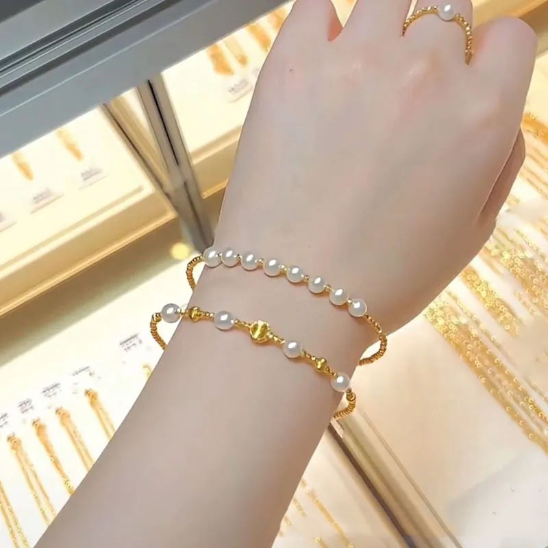 Effortless Glow Layered Shell Pearl Bracelet in Gold Tone