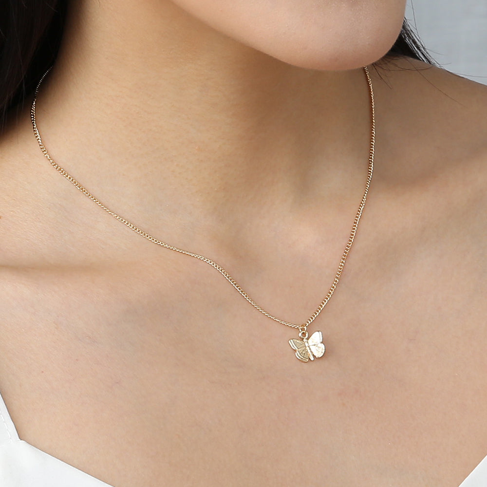 Subtle Charm Butterfly Pendant Necklace in Gold-Tone Alloy