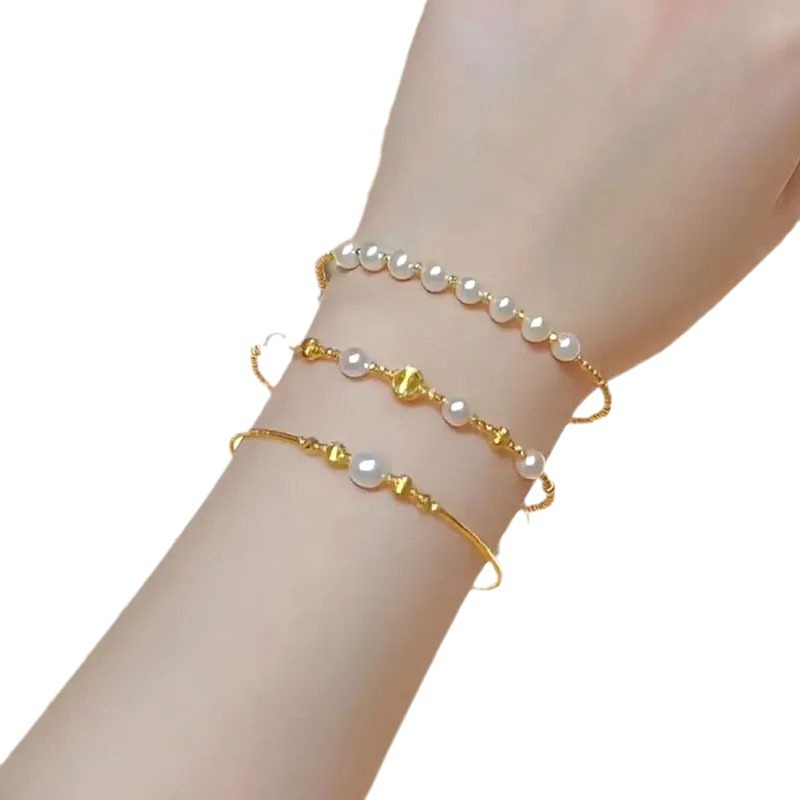 Effortless Glow Layered Shell Pearl Bracelet in Gold Tone